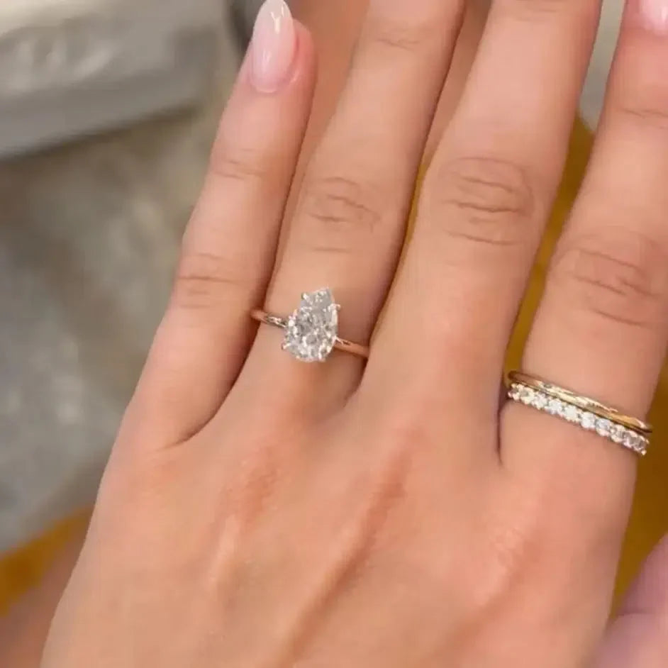 The Calista Crushed Ice Pear Cutt  Moissanite Ring (Rose)